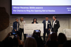 Sarah Daniels accepting check at Qualcomm Ventures Female Founders Summit